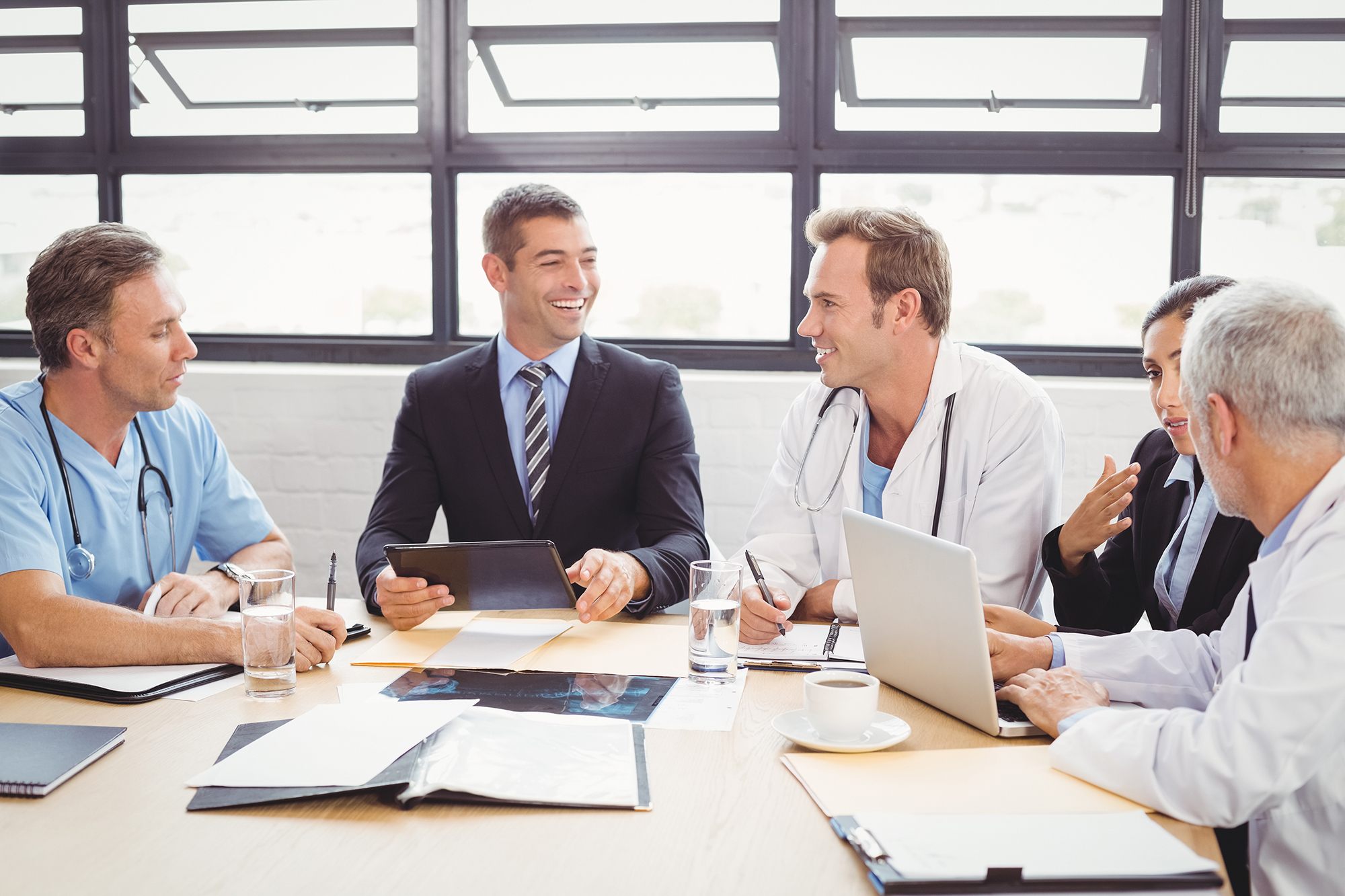 shutterstock_606977243 medical team red ActionCue CI Solution for Executives